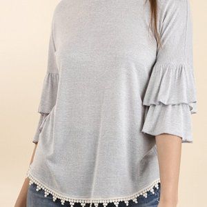 Grey 3/4 sleeve ruffle white pom poms